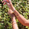 Pulseira Escrava tipo Trança em Aço Dourado