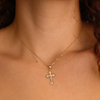 Crucifixo em Ouro de 19.2kl com Cristo em Alto Relevo e efeito pontilhado na cruz.  O Crucifixo em Ouro de 19.2kl é uma peça de arte sacra que combina a beleza do ouro com uma representação detalhada de Cristo em alto relevo e um efeito pontilhado na cruz, criando uma obra-prima de devoção e espiritualidade.