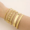 Pulseira Escrava tipo Trança em Aço Dourado