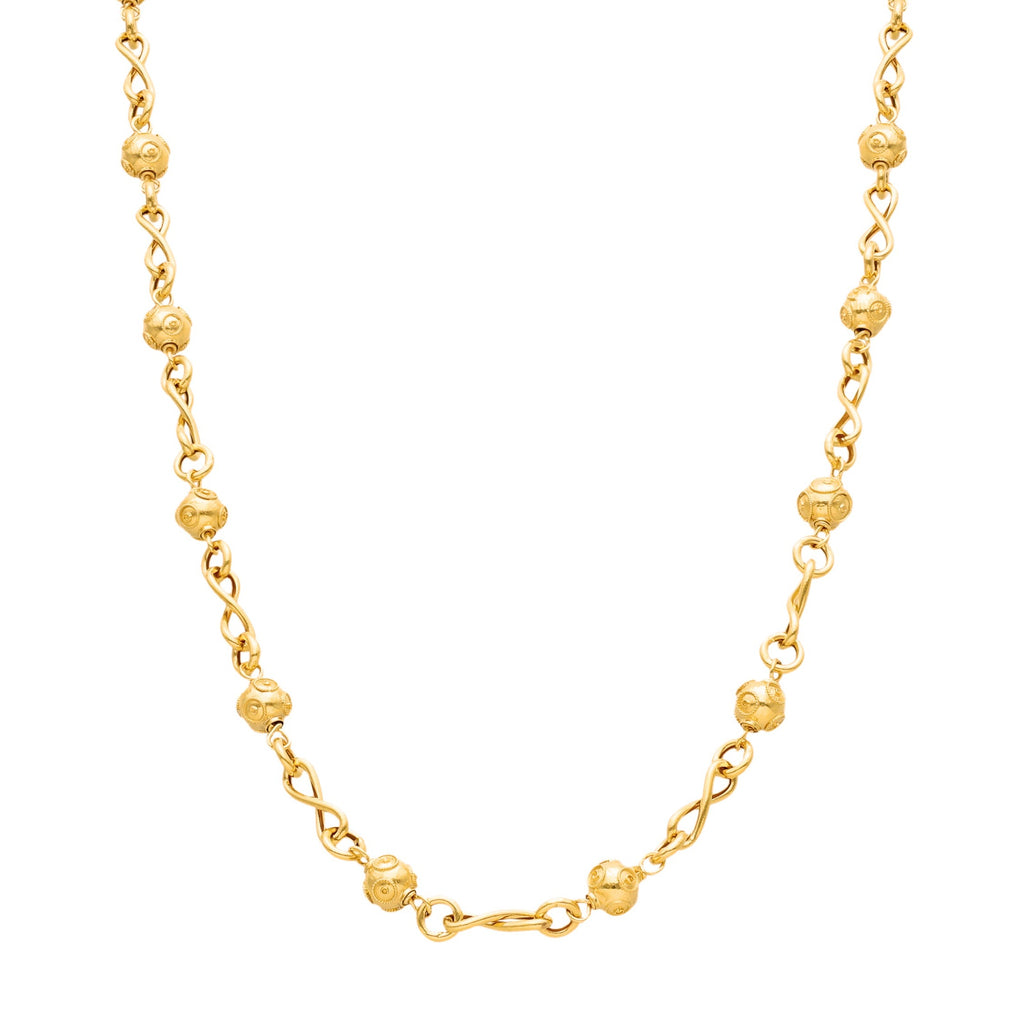 Fio em Ouro de 19.2kl, adornada de elegantes Contas de Viana intercaladas com Elos Infinitum.  Elegante e sofisticado, este Fio de Ouro com Contas de Viana conjuga a modernidade e a tradição numa mesma joia delicada. Ideal para oferecer a alguém especial ou para se presentear a si próprio, este colar de contas de viana é perfeito para complementar os seus visuais.
