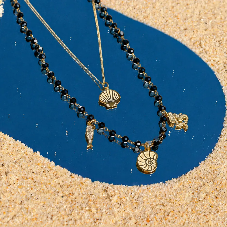 Colar Oceano com Contas Pretas e Prata Dourada