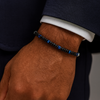 Pulseira Noctis em Aço Azul e Contas Cinza