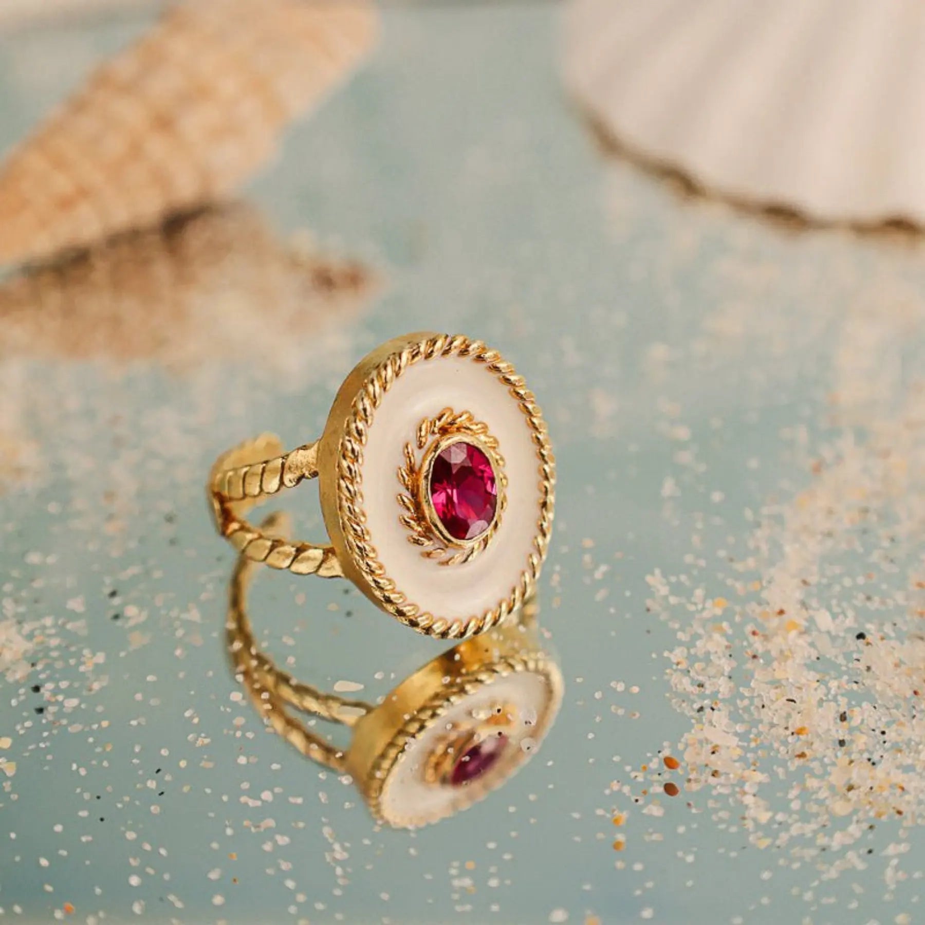Anel Equinocio em Prata Dourada com Zircão Rosa e Esmalte Branco - Loja do Ouro