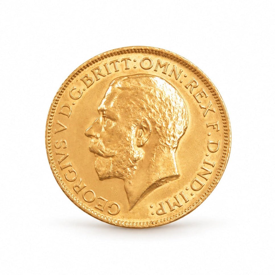 Anverso da libra do Rei Jorge V em ouro 22kl, com retrato de perfil sobre fundo branco.