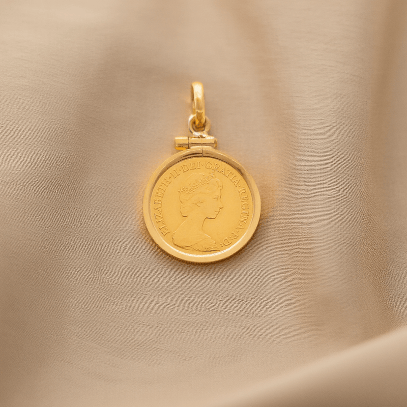 Meia Libra Rainha Isabel II (1982) em Ouro 22kl com Aro Simples em Ouro de 19kl - Loja do Ouro
