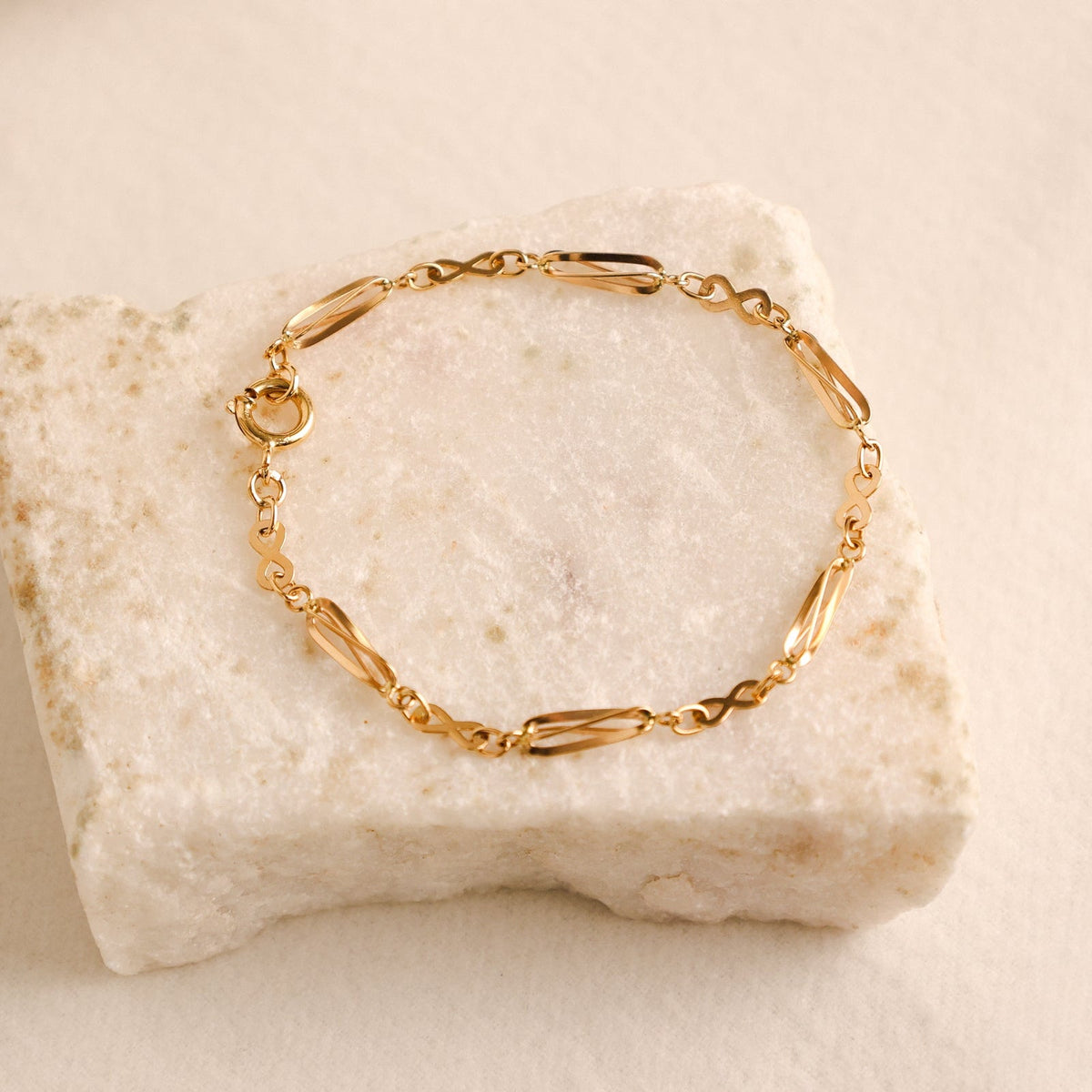 Pulseira com Rocas e Infinitos em Ouro 19kl (18cm) - Loja do Ouro
