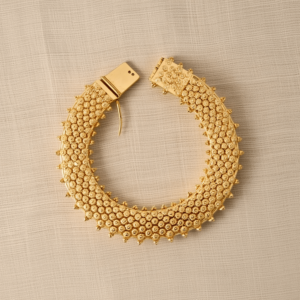Pulsera vintage en oro 19kl con caracoles y granitos (17cm) - Gold Store Premium