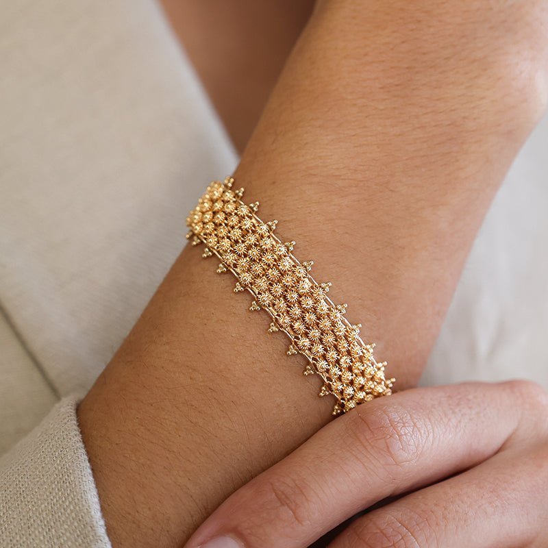 Pulsera vintage en oro 19kl con caracoles y granitos (17cm) - Gold Store Premium